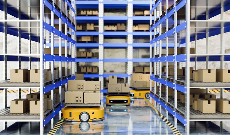 yellow AMRs Autonomous Mobile Robots in a warehouse setting
