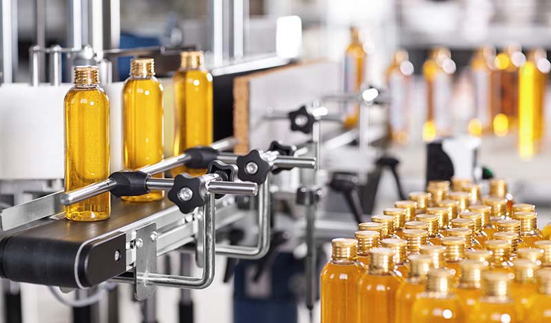 Cosmetic Manufacturing with orange glass bottles